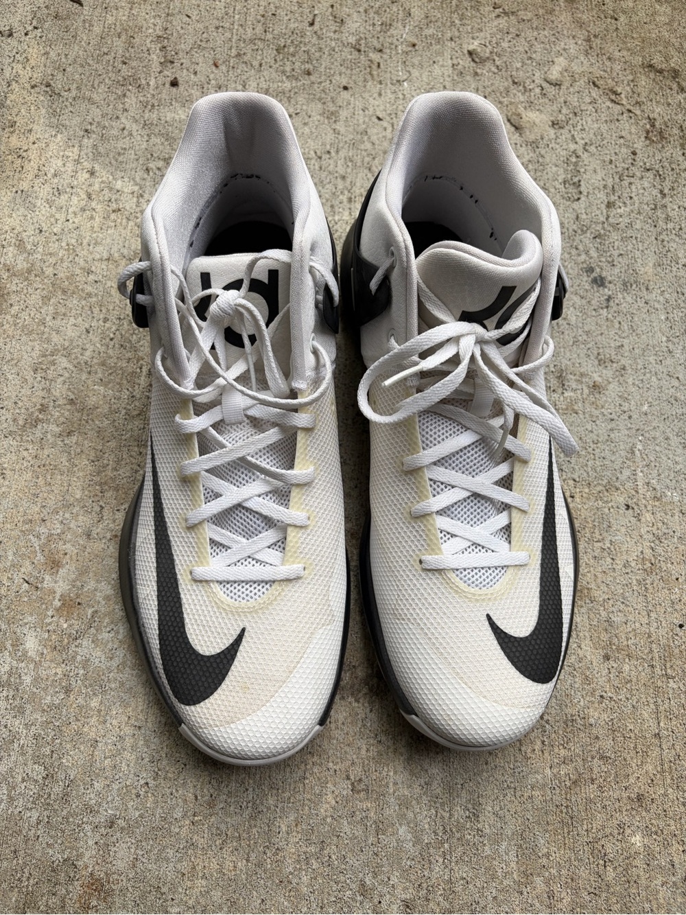 Nike Men’s White Athletic Shoes with Black Swoosh